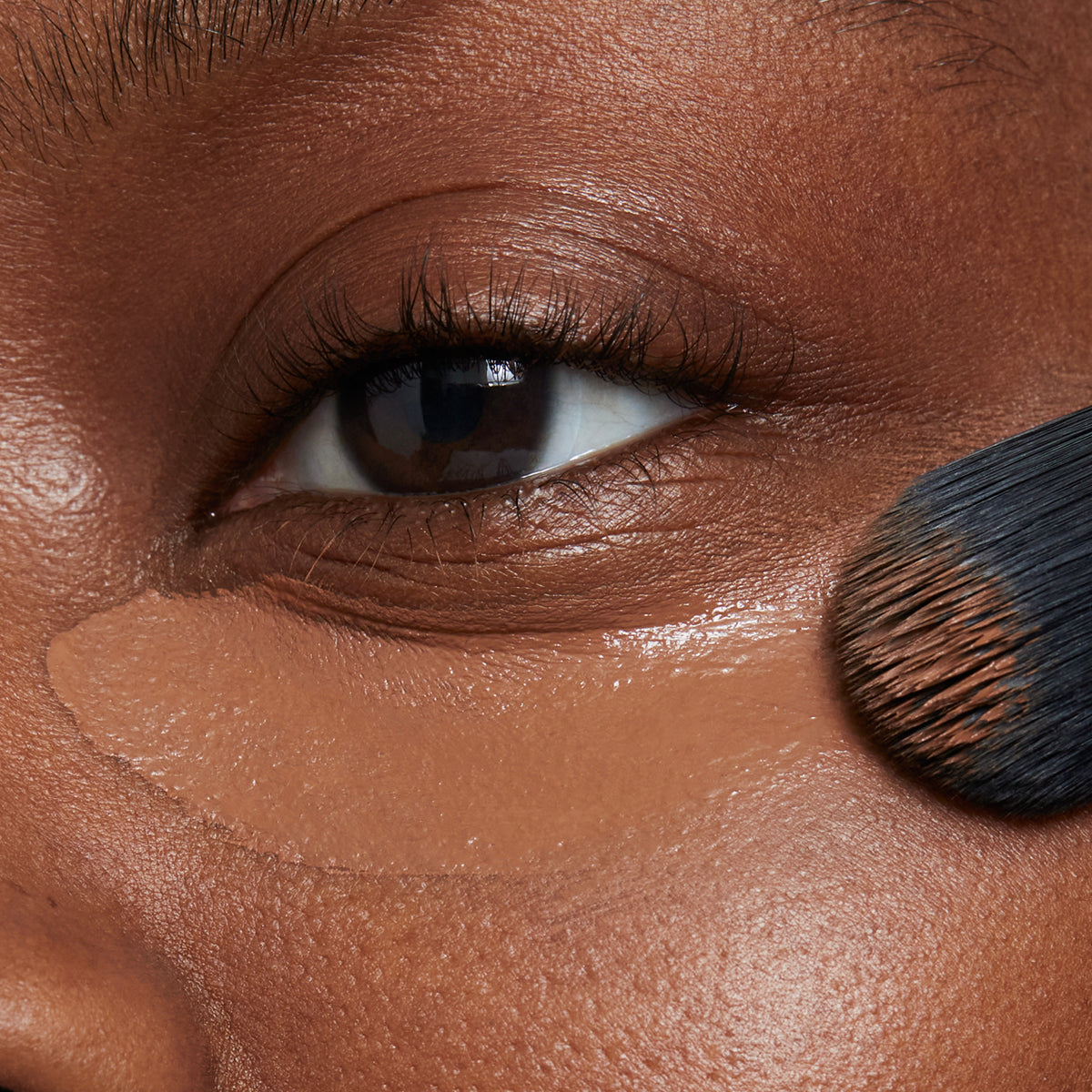 Bourbon concealer coverage on model under eyes