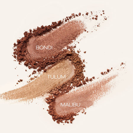 Powder macro shot of our bronzers crushed. 3 swipes showing darkest to lightest