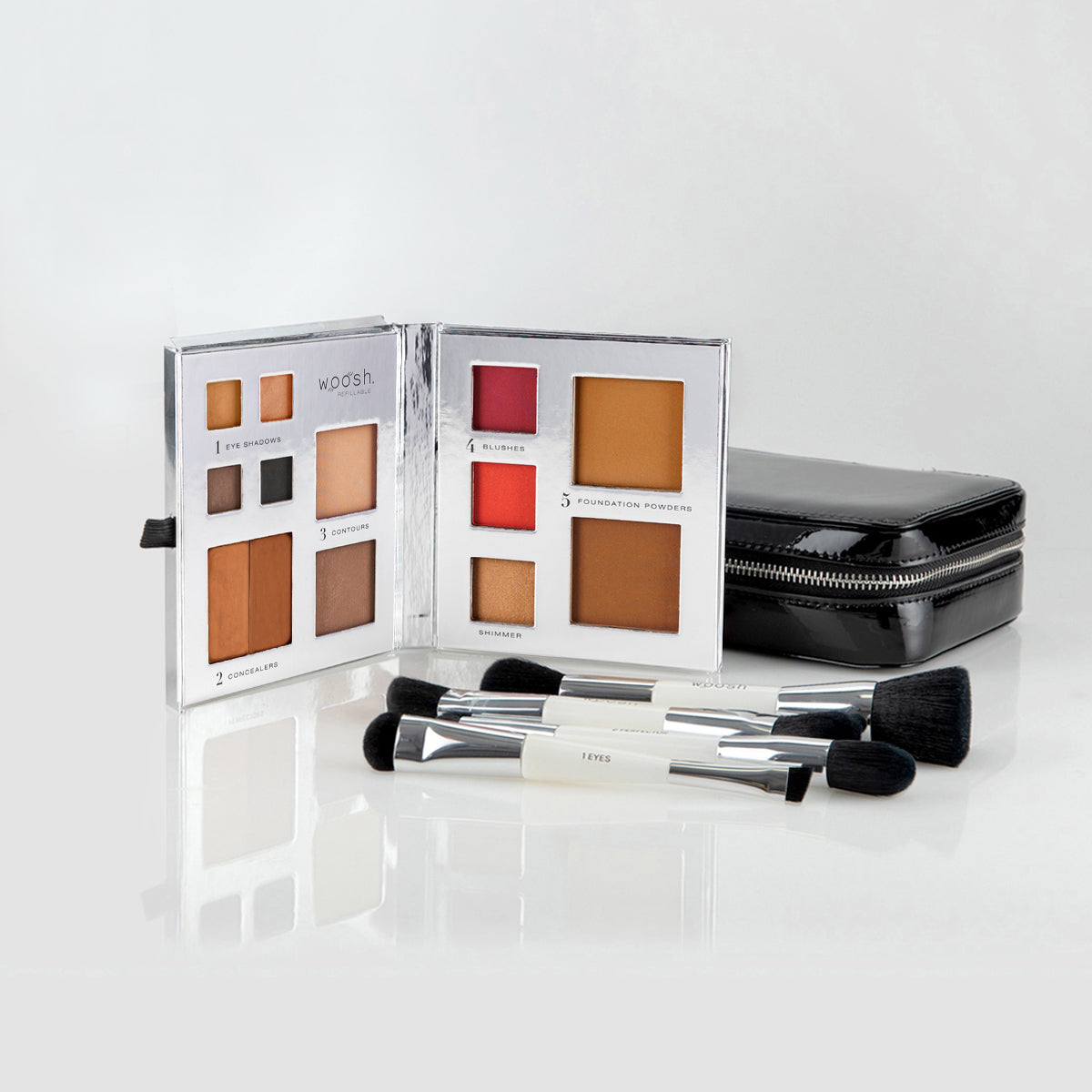The Jetsetter makeup bundle includes a Fold Out Face 13 pan palette, black case, and essential brush set with 4 dual-ended brushes