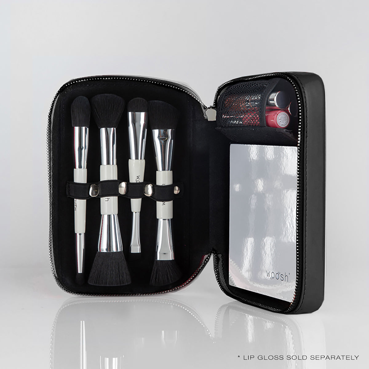 Black Fold Out Case can hold: 4 essential brushes, 3 lip glosses, and 1 fold out face palette. Has adjustable elastic straps that snap into place to make it easy to add brushes of different sizes. Has a mesh pocket perfect for holding spare makeup you need on the go.