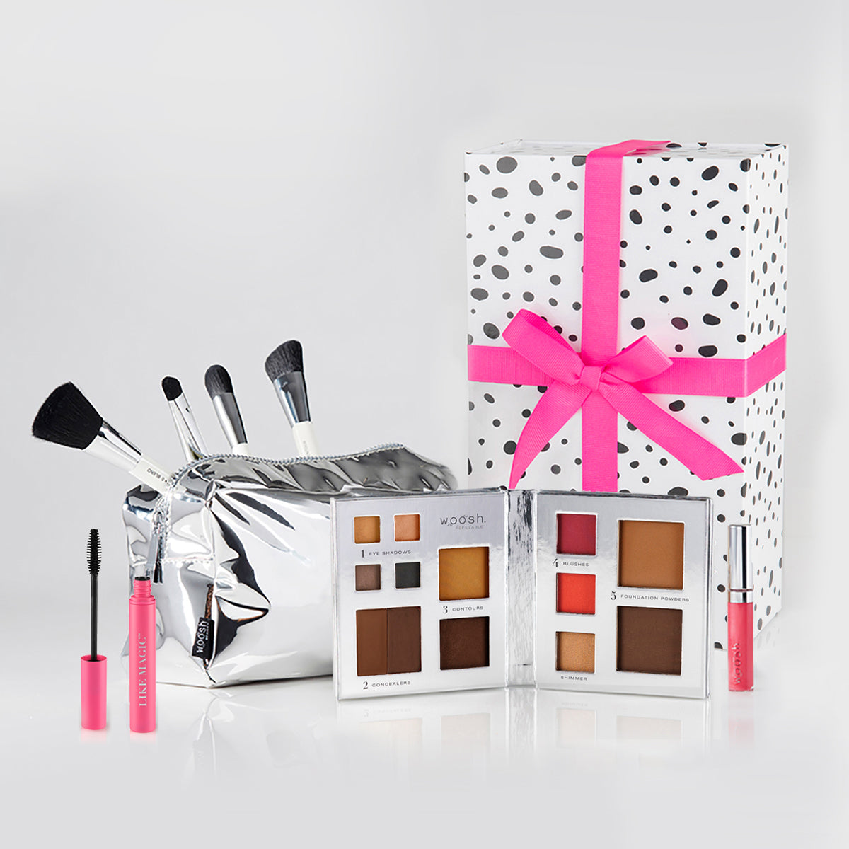 I want it all bundle image. Includes 13 pan Refillable Fold out Face Palette, Like magic tubing mascara, pink natural lip gloss, essential brush set, essential brush bag and polka dot gift box with pink ribbon. 