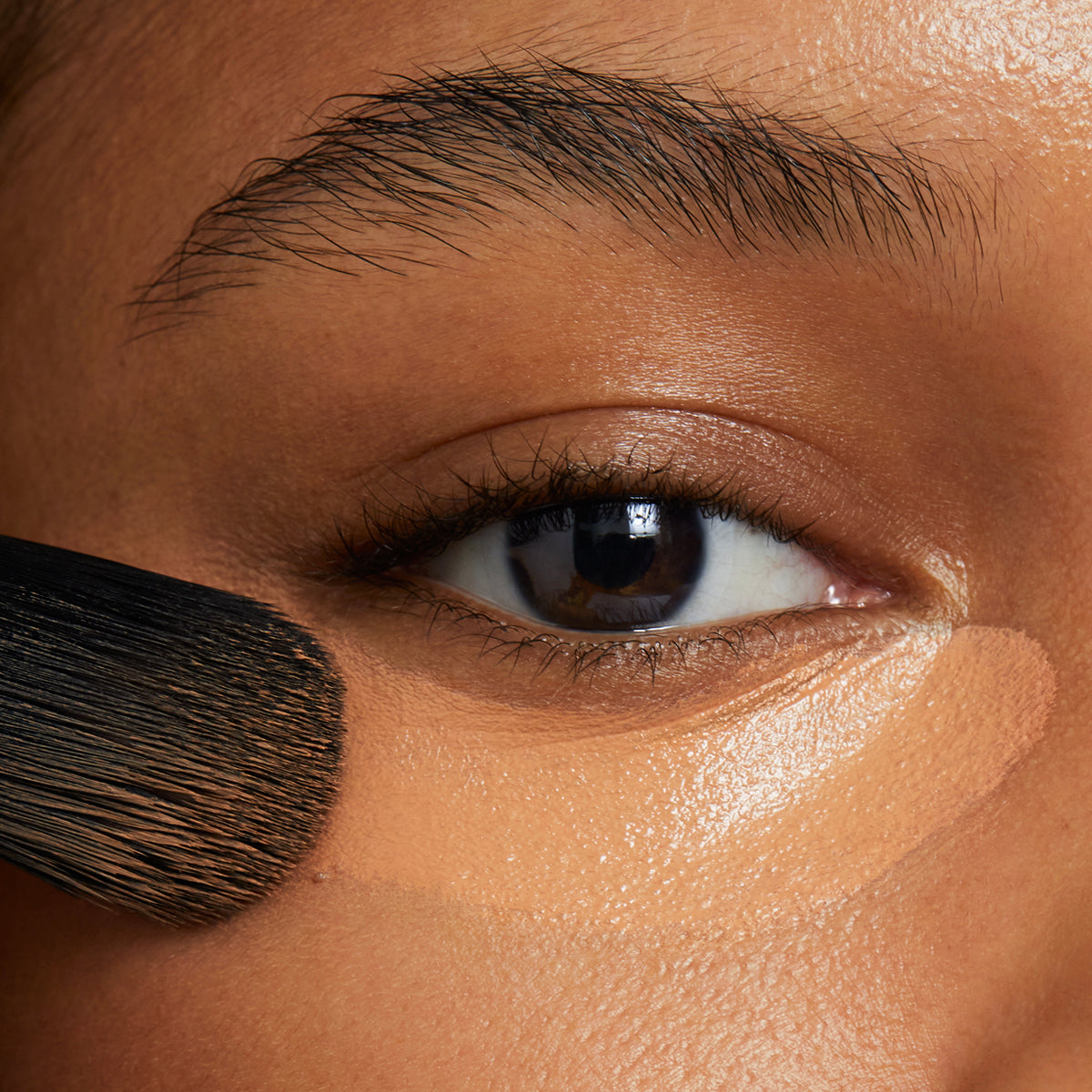 Concealer coverage on model under eyes