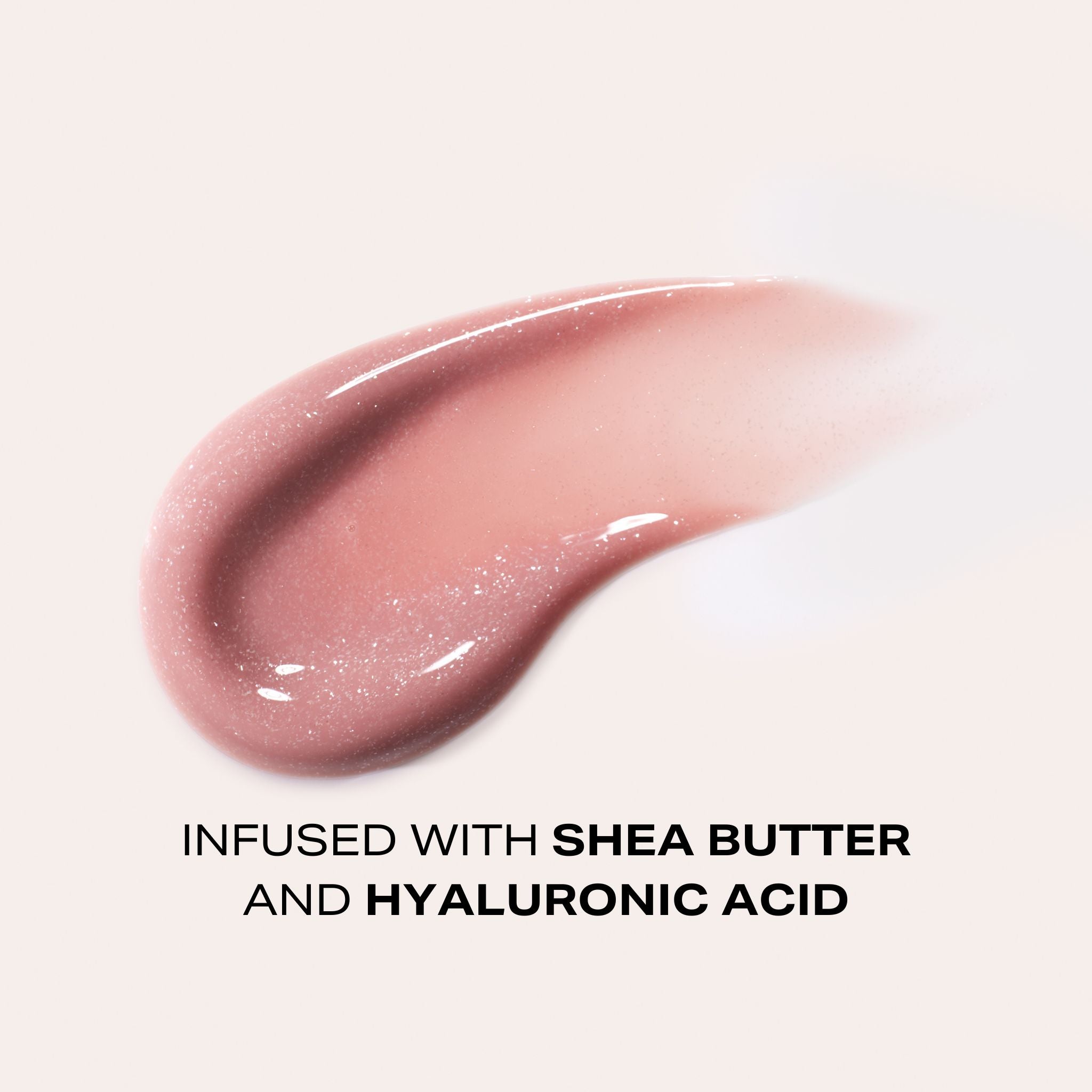 Perfect glob of Veil lip gloss, previously known as beige frosted. The ideal nude pink with glitter sparkle
