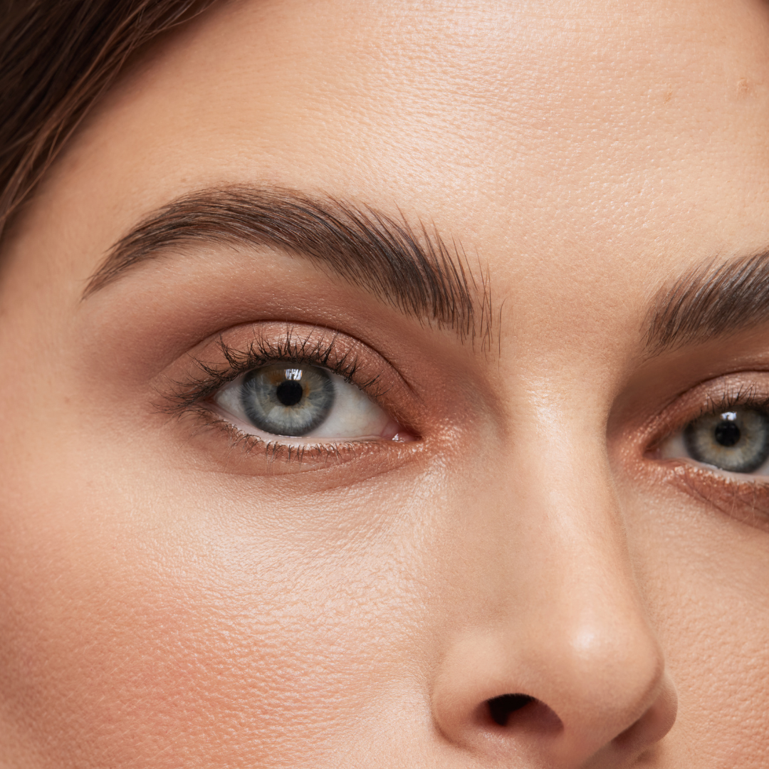 up close shot of model wearing gilded earth eyeshadow quad