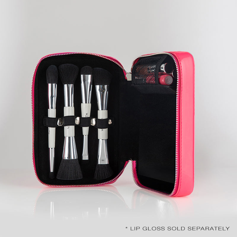 The fold out case can hold three spin on lip glosses, 4 brushes from the essential brush set and the fold out palette (that is sold separately)
