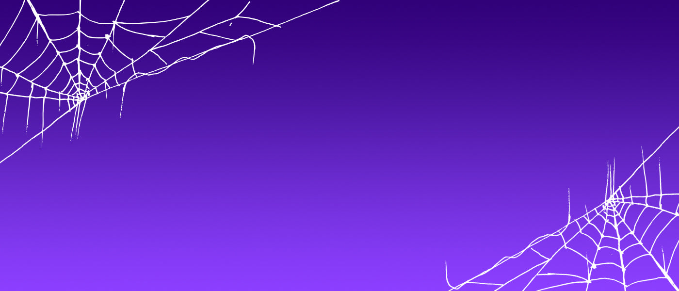 Spiderwebs against a purple background