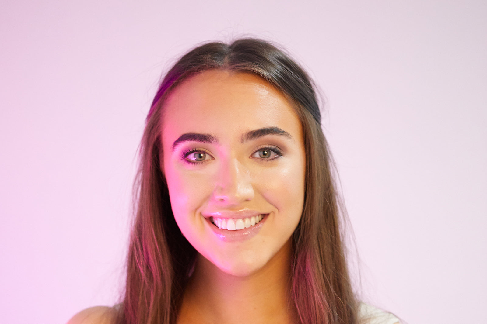 Model wearing a blended eyeshadow makeup look using the Arc Brush