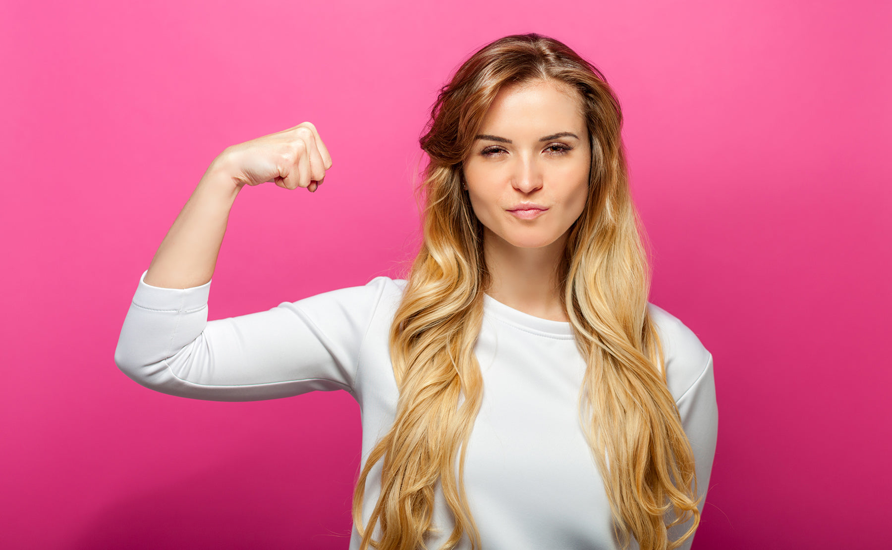 Woman flexing her biceps