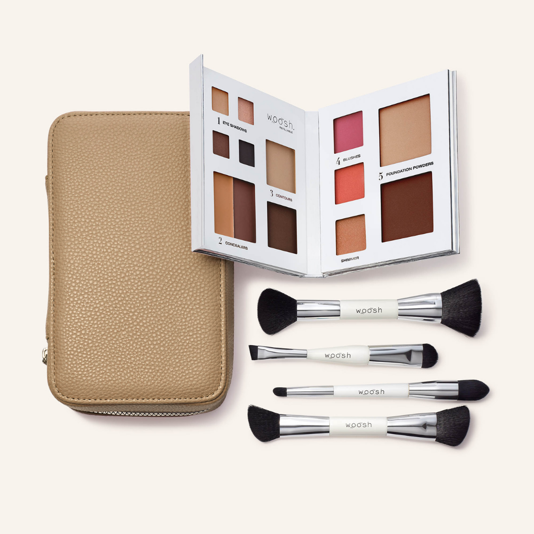 The Jetsetter bundle in shade Sand. The fold out case is the perfect camel tan  shade. Bundle includes the refillable 13 pan Fold out Face palette and he dual ended. vegan, synthetic brush set. Brush set includes a contour brush, eye shadow brush with liner end, concealer brush, and a blush and foundation powder brush