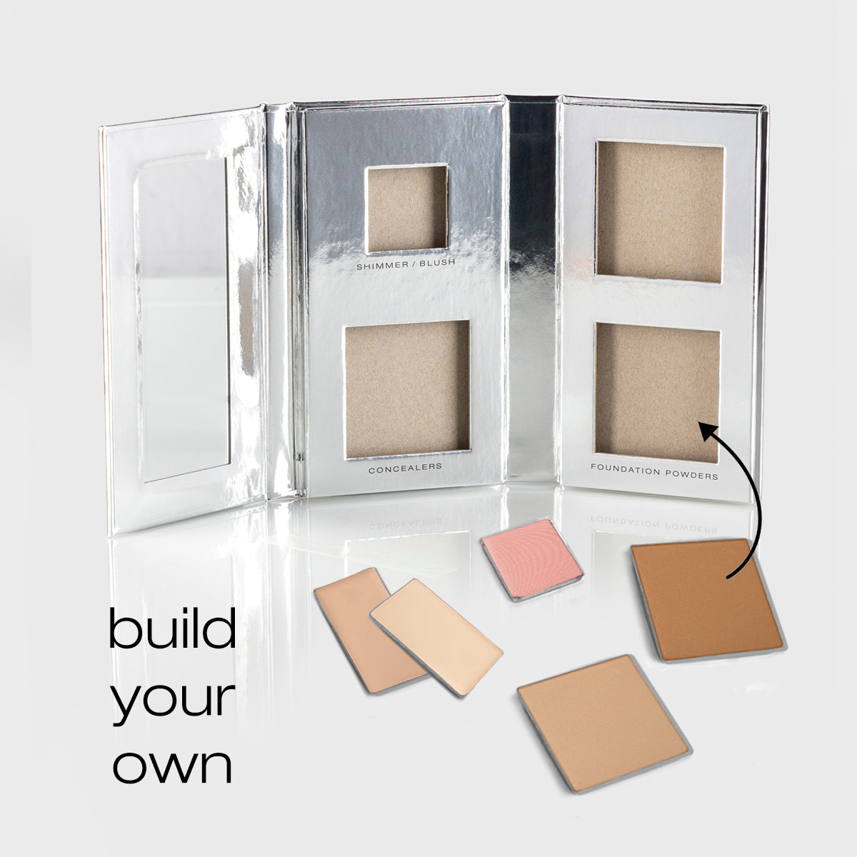 Fold Out Complexion Build your palette product showing an empty palette and one shimmer/blush pan, two concealer pans, and two foundation powder pans
