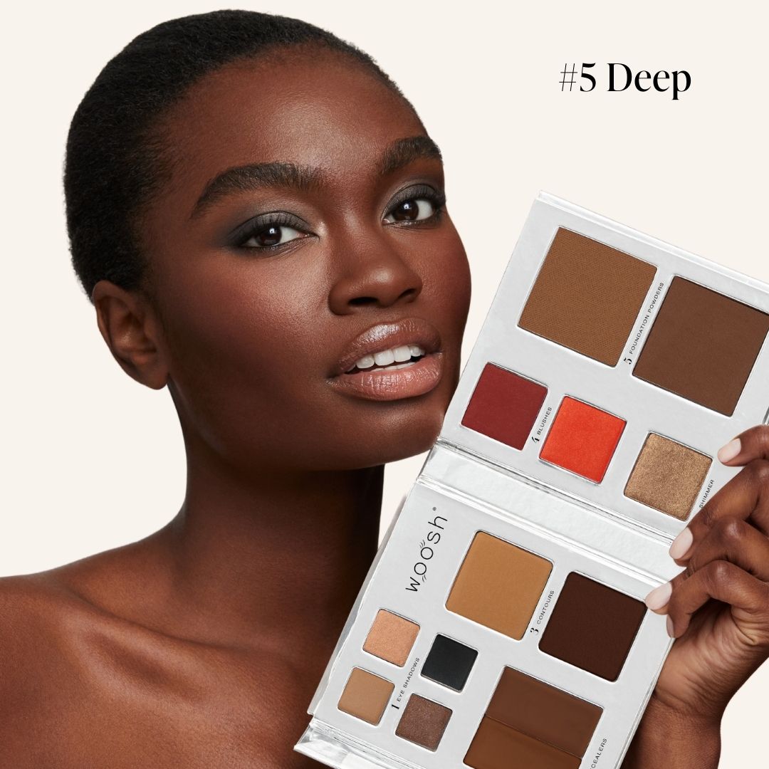 dark skinned model holding fold out face in shade #5 deep