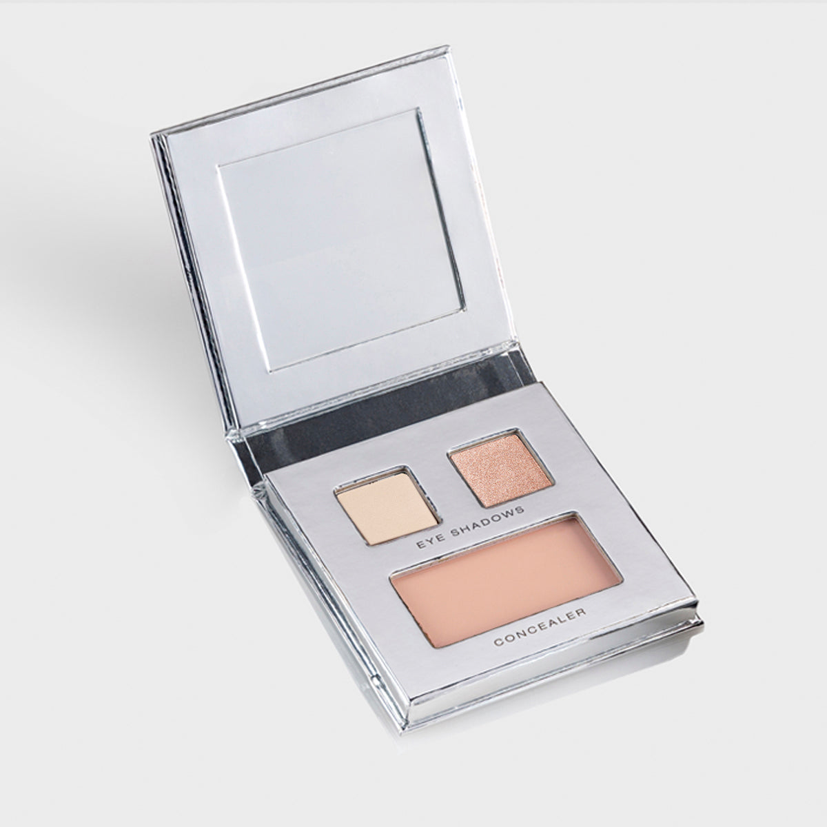 The open Fold Out Eyes palette with two eye shadows and one concealer in peaches 'n cream