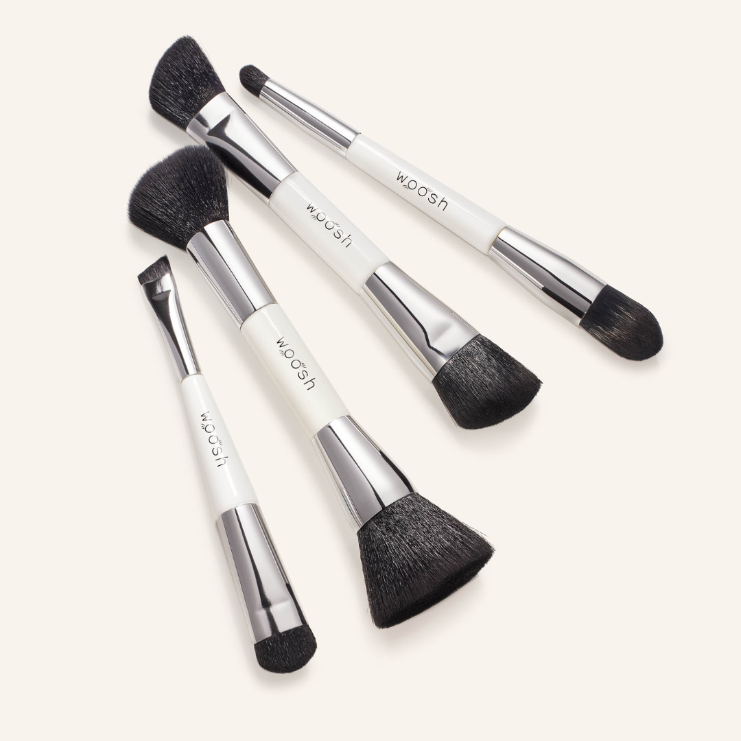 4 dual-ended essential makeup brushes in a set includes an eye brush, a concealer brush, a contour brush and a blush and blend brush, all numbered to correspond with the fold out face 