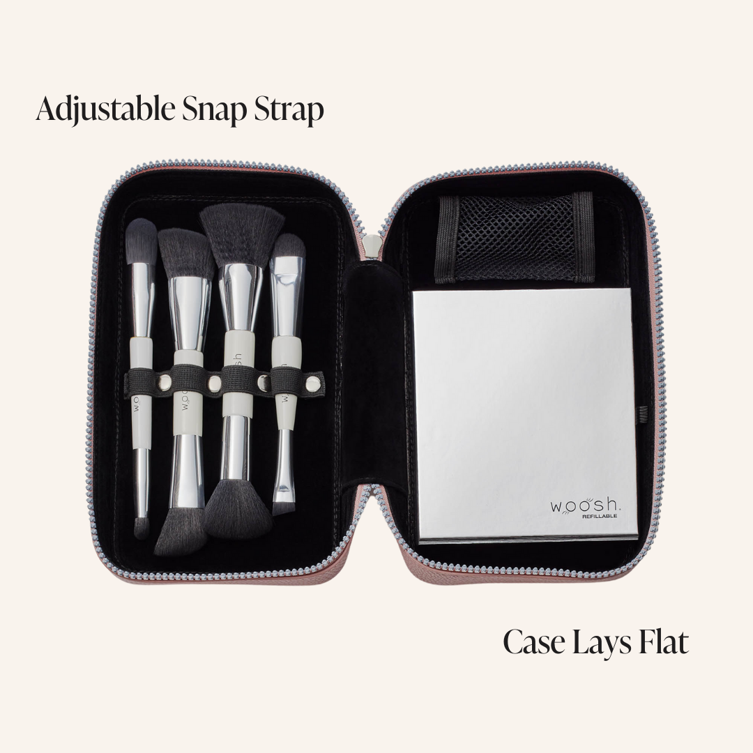 Fold out case open with palette and brushes inside. he new luxe version of the case has the adjustable snap strap and the case lays perfectly flat