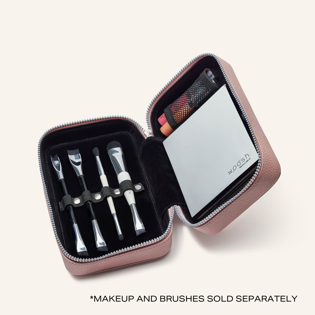 Our fold out case shown open with makeup and brushes inside. Makeup and brushes sold separately.