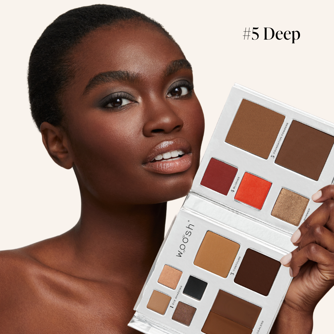 Model holding our refillable Fold out Face palette in shade #5 deep