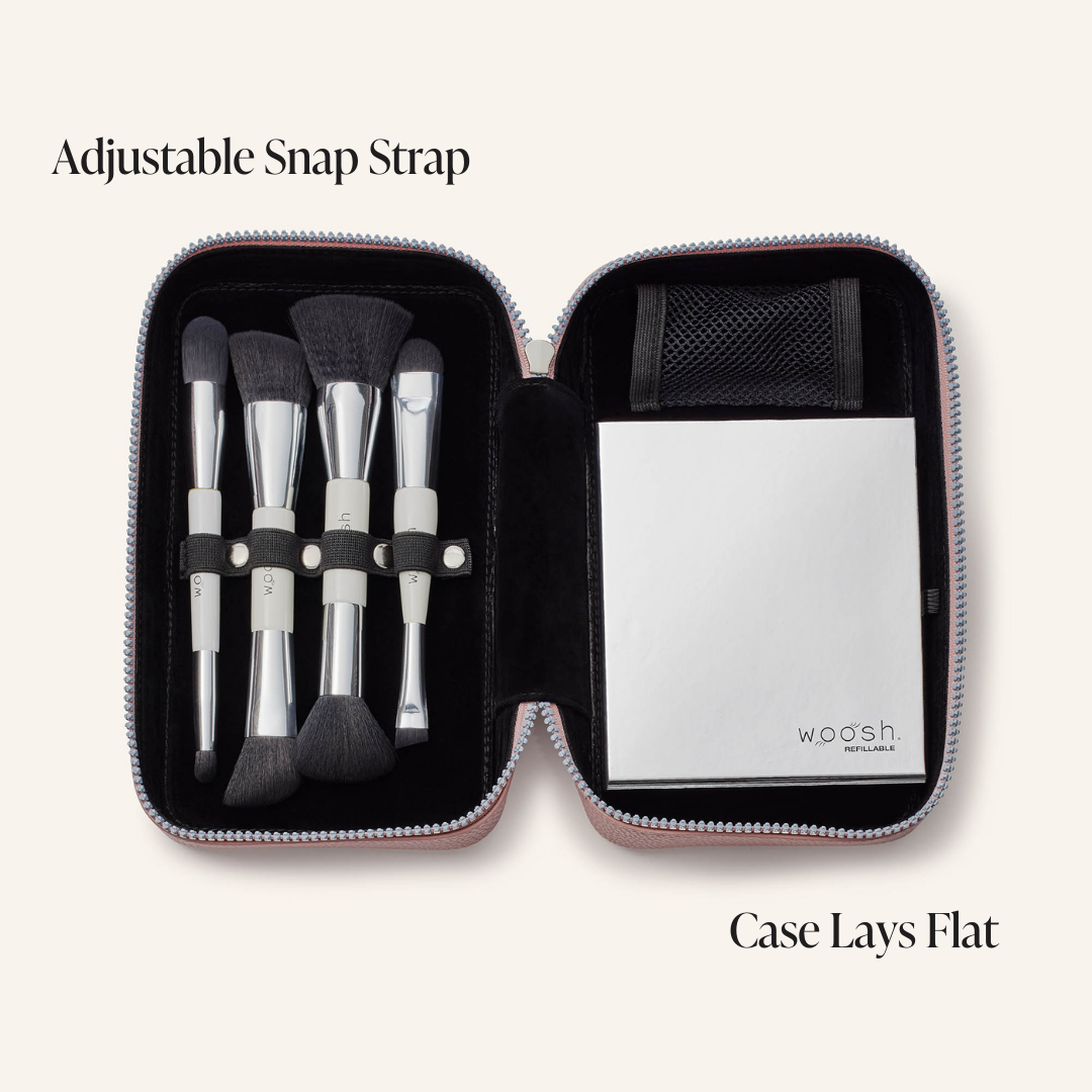 Fold out case open with palette and brushes inside. he new luxe version of the case has the adjustable snap strap and the case lays perfectly flat