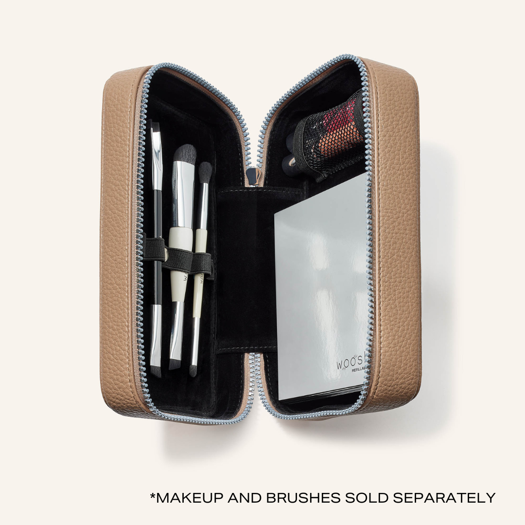 Our fold out case shown open with makeup and brushes inside. Makleup and brushes sold separately.