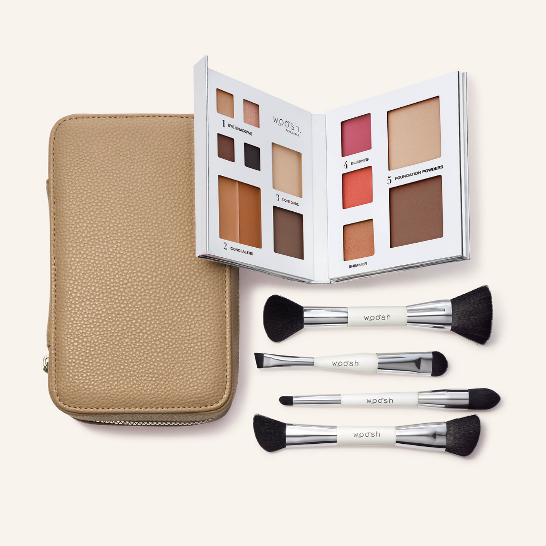 The Jetsetter bundle in shade Sand. The fold out case is the perfect camel tan  shade. Bundle includes the refillable 13 pan Fold out Face palette and he dual ended. vegan, synthetic brush set. Brush set includes a contour brush, eye shadow brush with liner end, concealer brush, and a blush and foundation powder brush