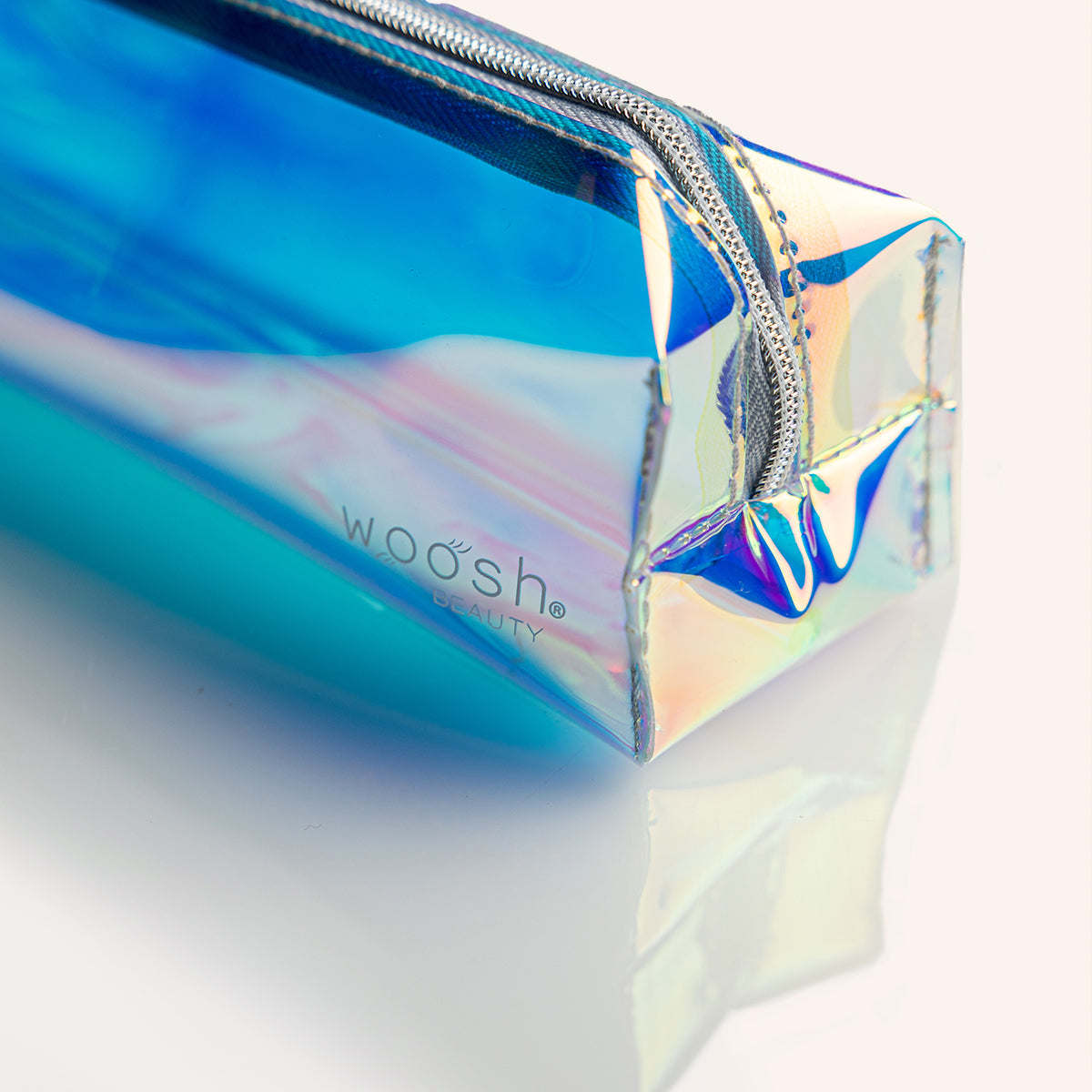 Close up of the Woosh Beauty Prism Makeup pouch  to show gusseted side to expand as needed