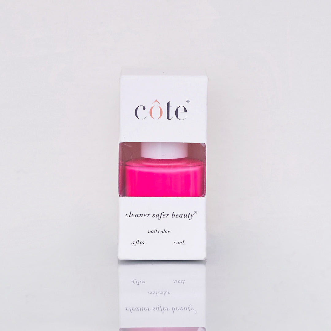 Neon Pink Cote Nail Polish in packaging