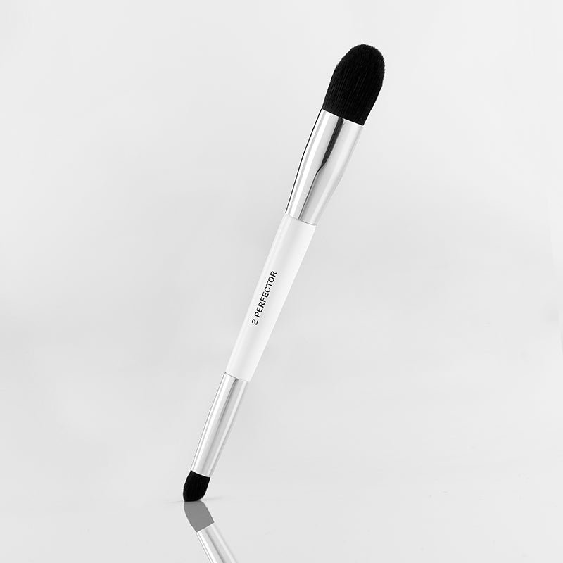 Essential perfector brush with angled end and thick end for covering blemishes and dark spots