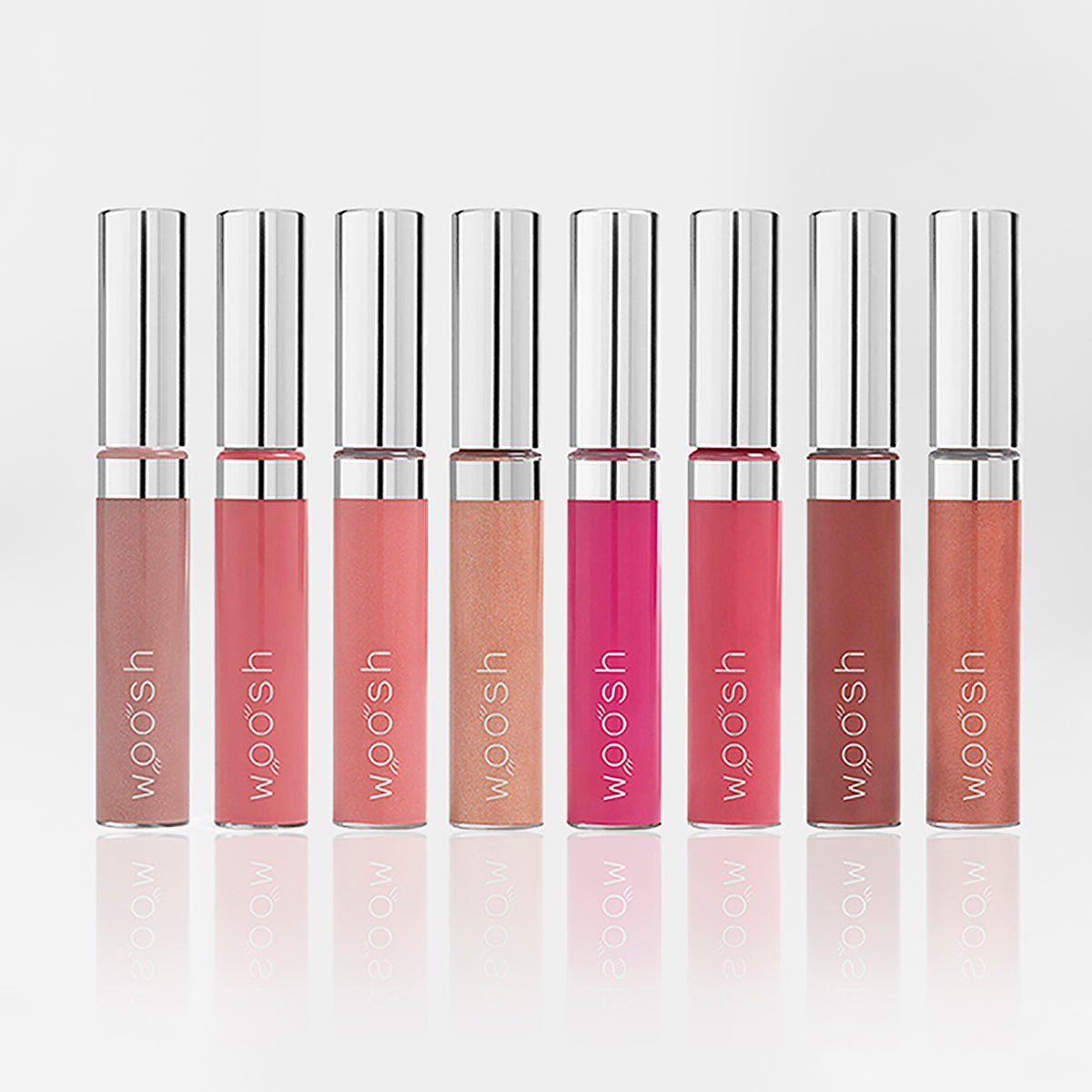 The boss gloss bundle in shades beige frosted (shimmer), beige natural, glam taupe (shimmer), glam peach (shimmer), pink sheer, pink natural, rich toast (shimmer), and rich copper (shimmer)