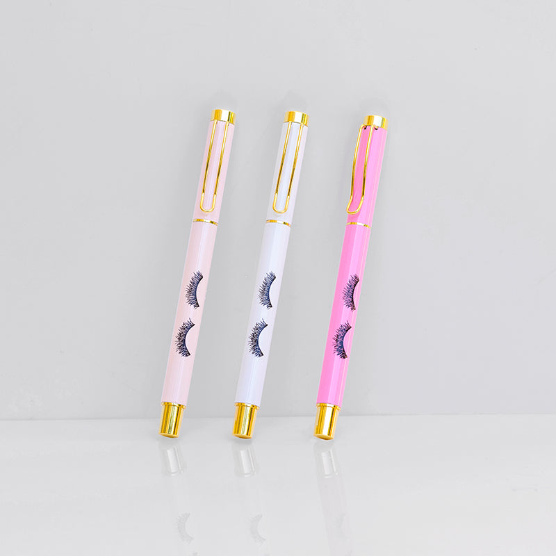 Set of three pens in pink shades (light pink, white, and hot pink) with gold trim and eyelash details