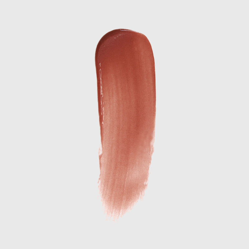 Demonstration of the rich copper spin on lip gloss swatch spread color