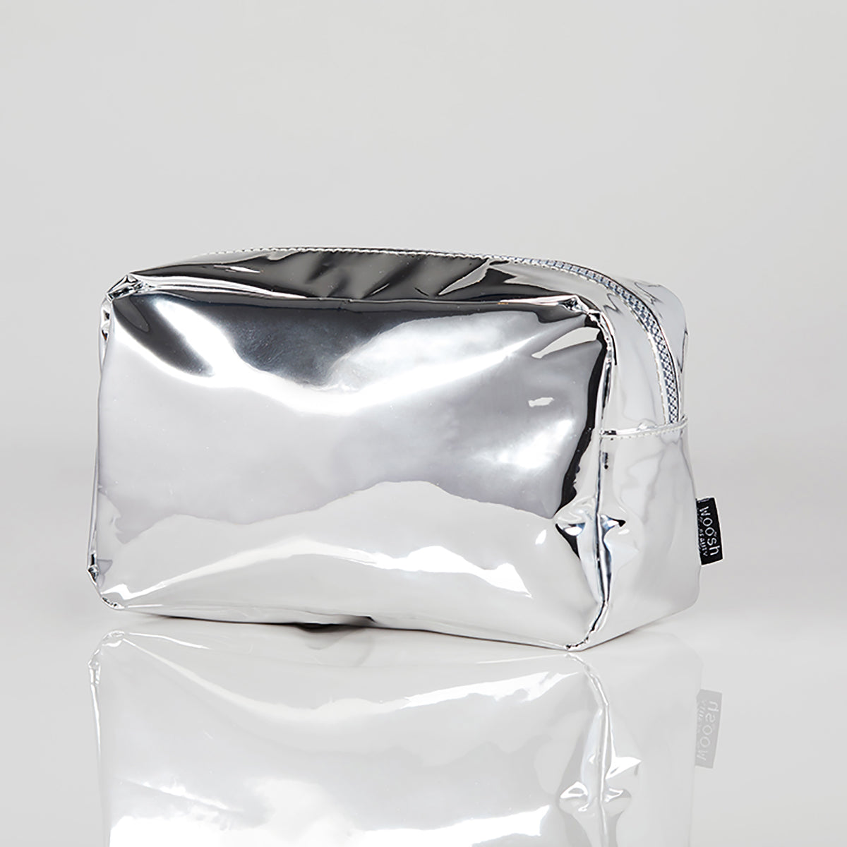 Metallic silver vegan essential makeup back with large zipper by Woosh Beauty