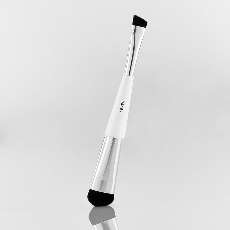 Dual ended vegan essential eye brush with an angled tip for applying shadow to the eye line and a round tip for adding colors to creases