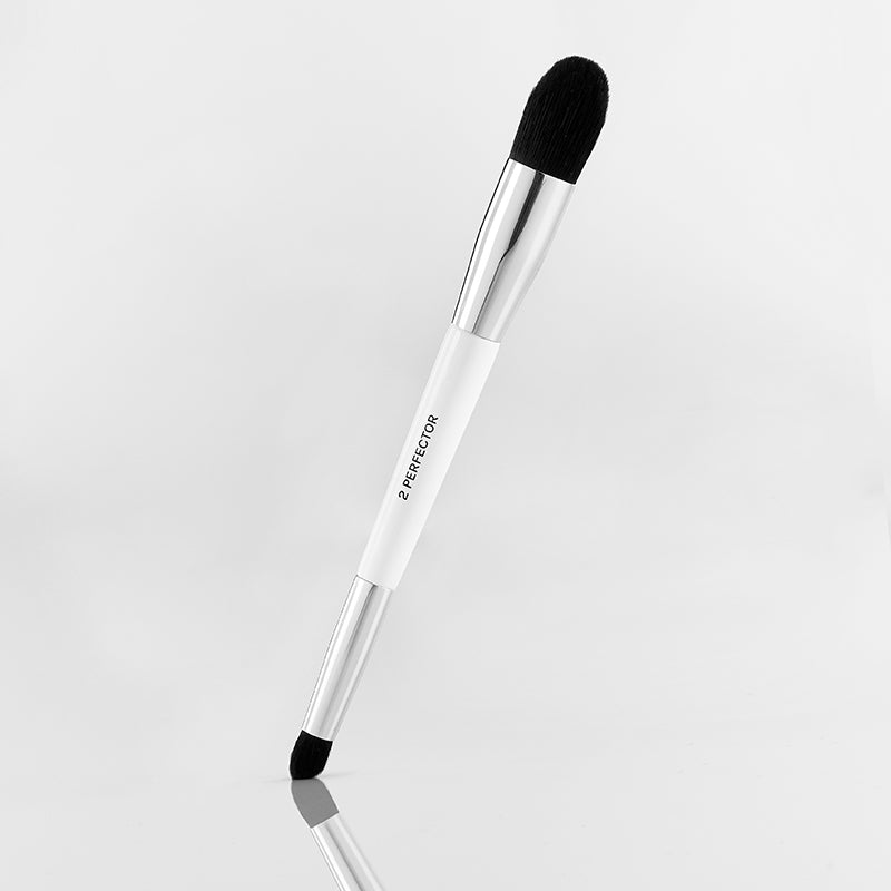 vegan dual ended concealer brush with smaller end to spot-treat markets and bigger tip to blot and conceal areas of discoloration