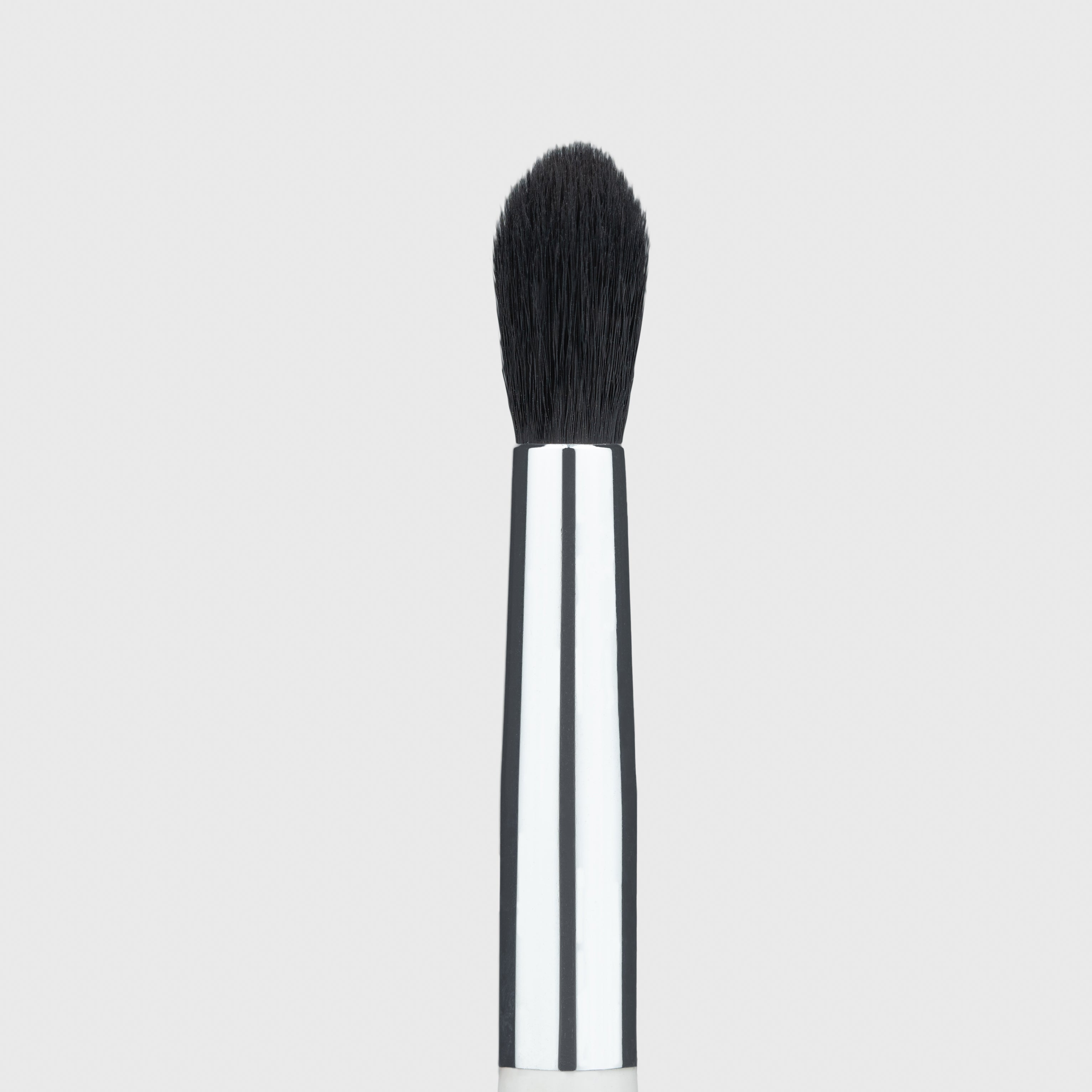 Close up of the larger and thicker end of the Woosh Beauty eye detailer brush